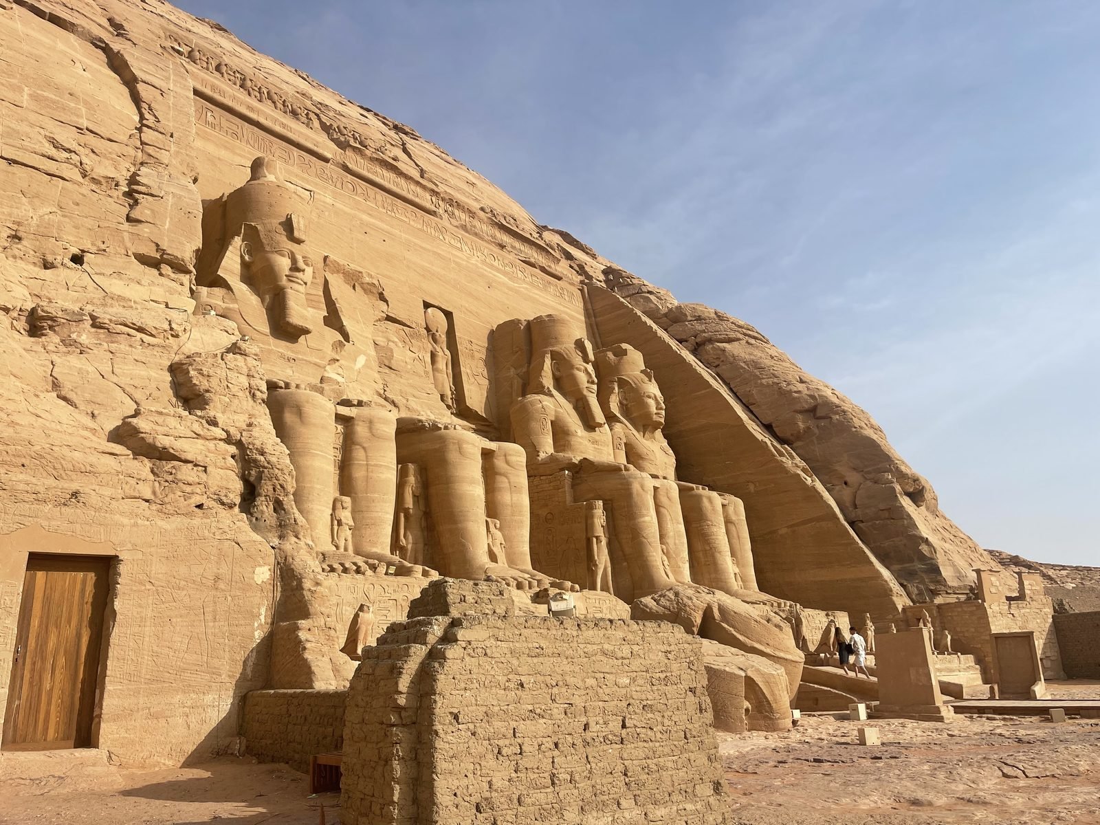 Abu Simbel Great Temple facade The facade of the Great Temple of Abu Simbel with the colossal statues of Ramses II, seen from the side in morning light