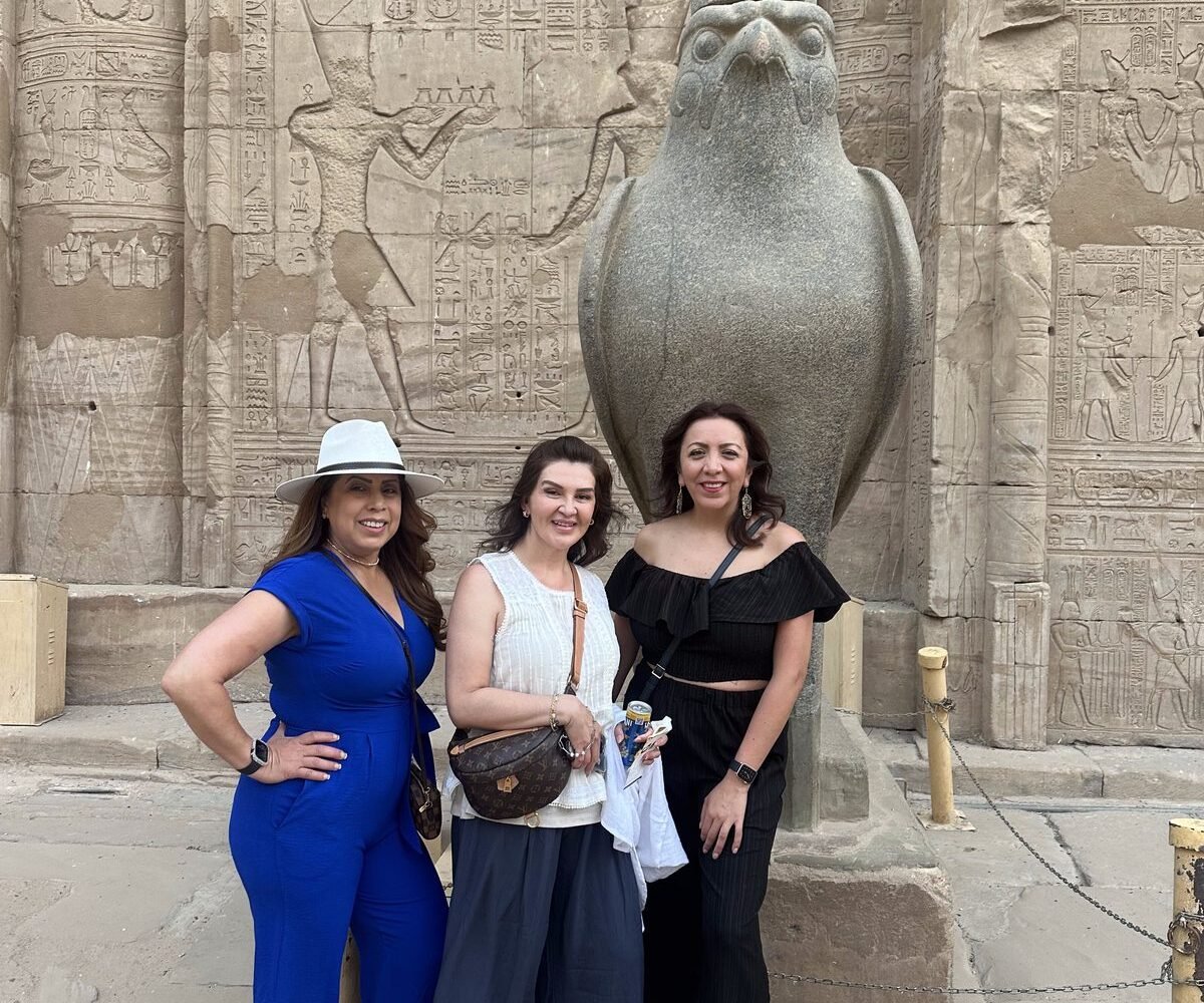 Guests of ours at the temple of Edfu, dressed for a hot morning at the temples