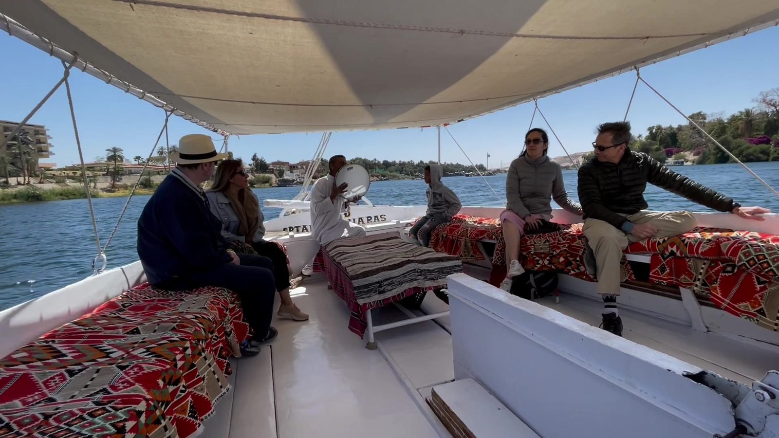 Guests sailing on a felucca on the Nile