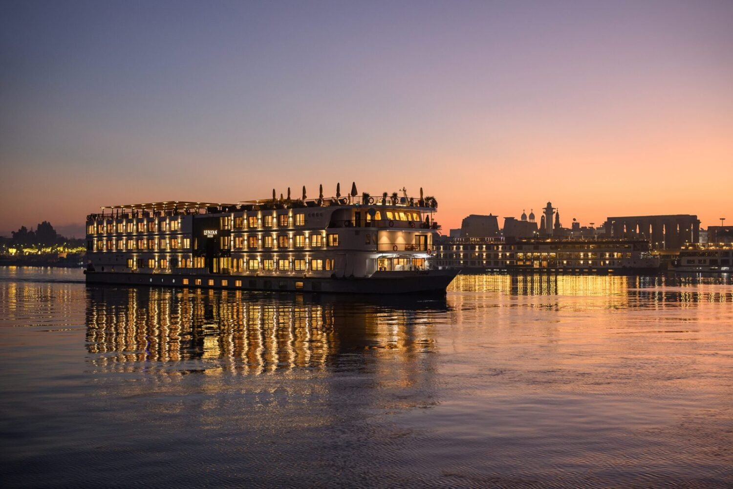 Le Fayan Suites on the Nile at sunset