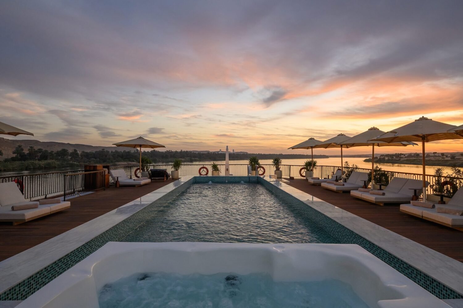 Sundeck pool at sunset on Le Fayan Suites