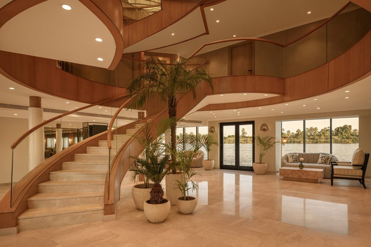 The spiral staircase in the atrium of Le Fayan Suites