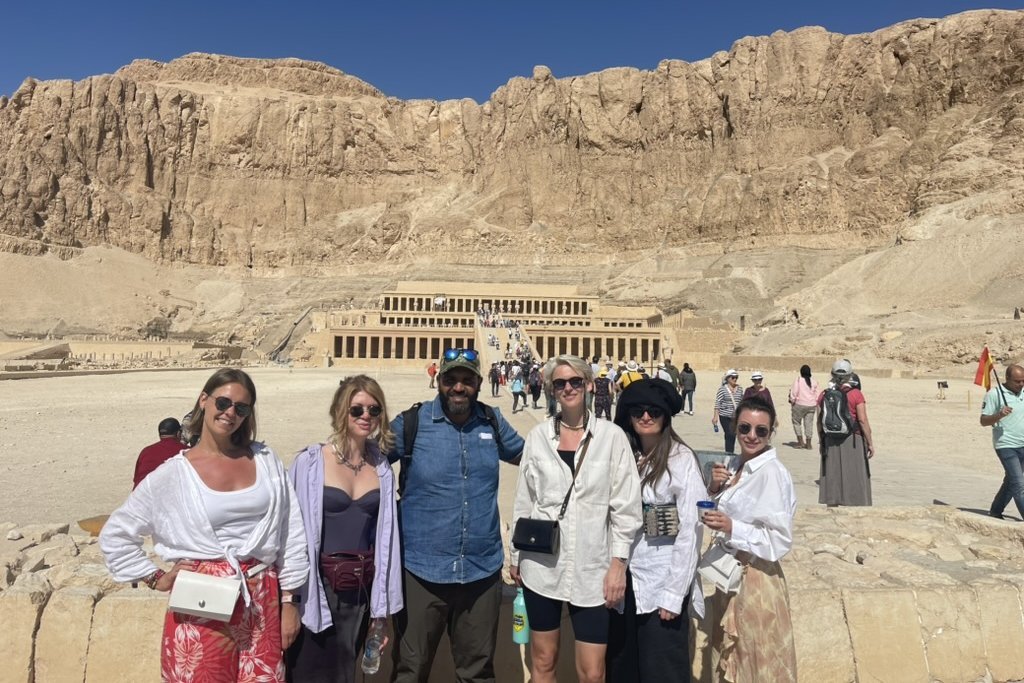 Mo Adam, licensed Egyptologist guide, with guests at the temple of Hatshepsut in Luxor