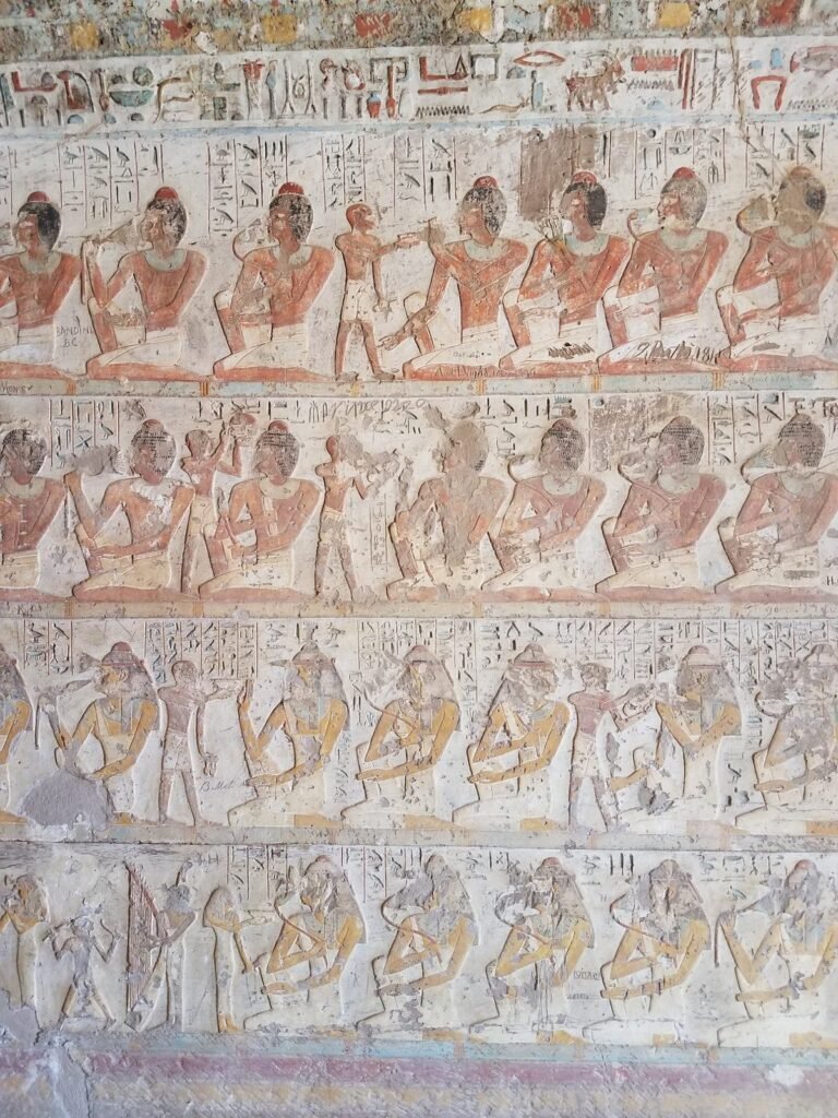 Painted registers of figures in the tomb of Paheri at El Kab