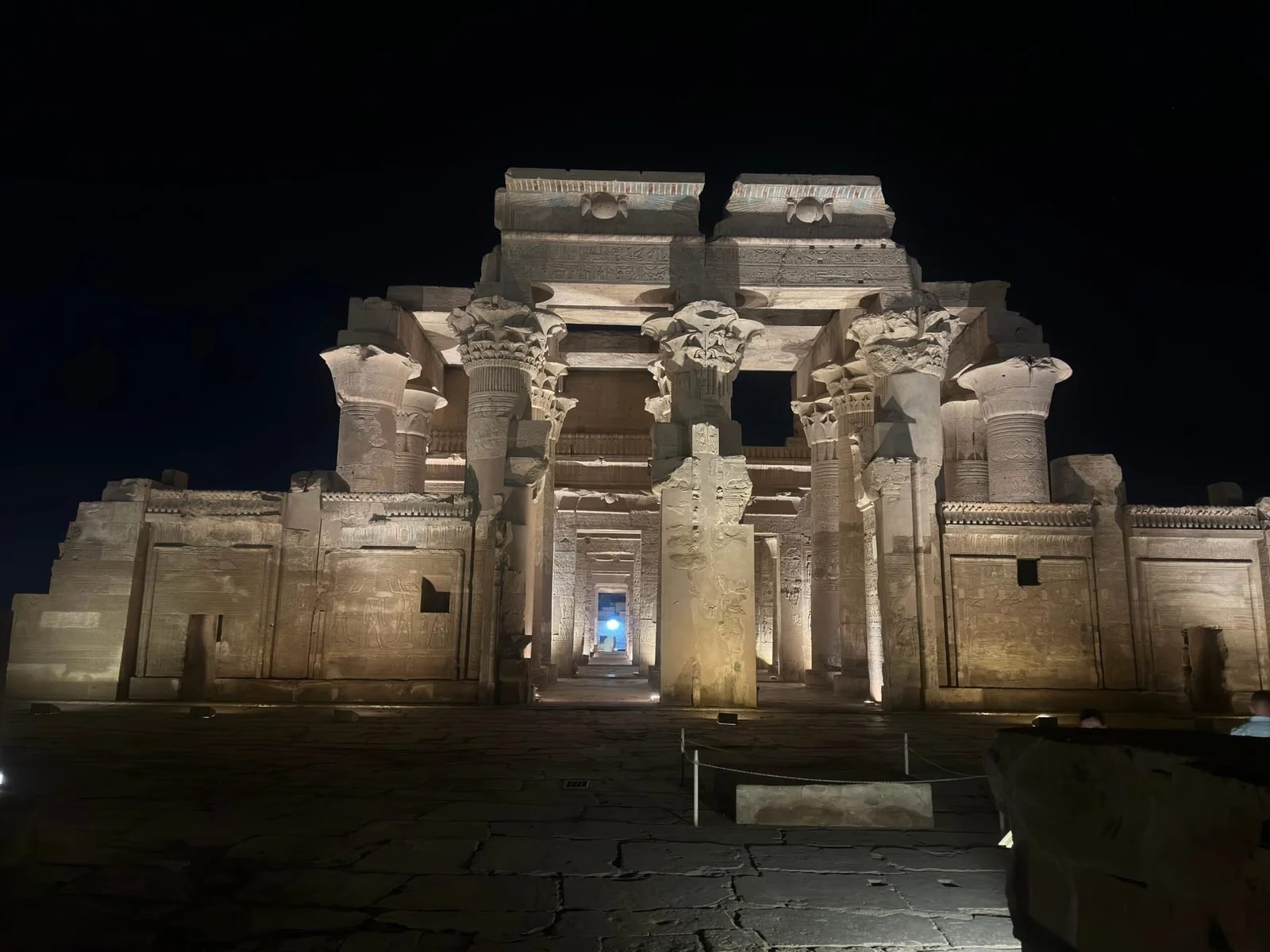 The facade of Kom Ombo temple at night during a private opening, completely empty